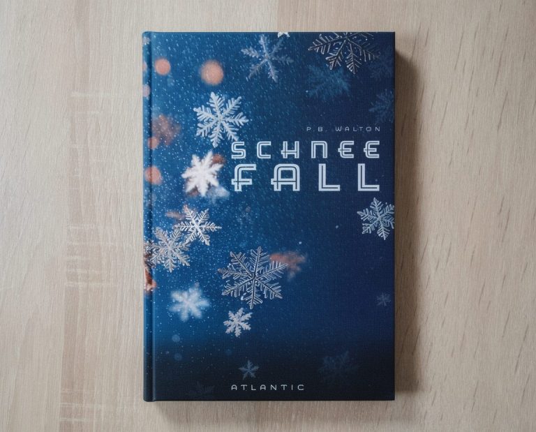 Buchcover von "Schneefall" mit blauer Hintergrundfarbe und Schneeflocken.
